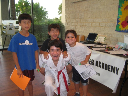 Commander Ben having fun with young Invasive Species Hunters last year at the Lady Bird Johnson Wildflower Center