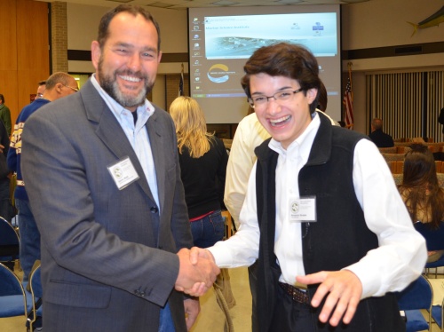 Dr. Damon Waitt and Commander Ben catch a moment together at the Invasive Plant and Pest Conference