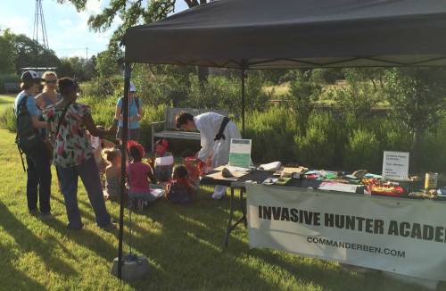The young Austin naturalists found a great spot near the academy table to sample invasive plant species and work on their Invasive Hunter action diorama.